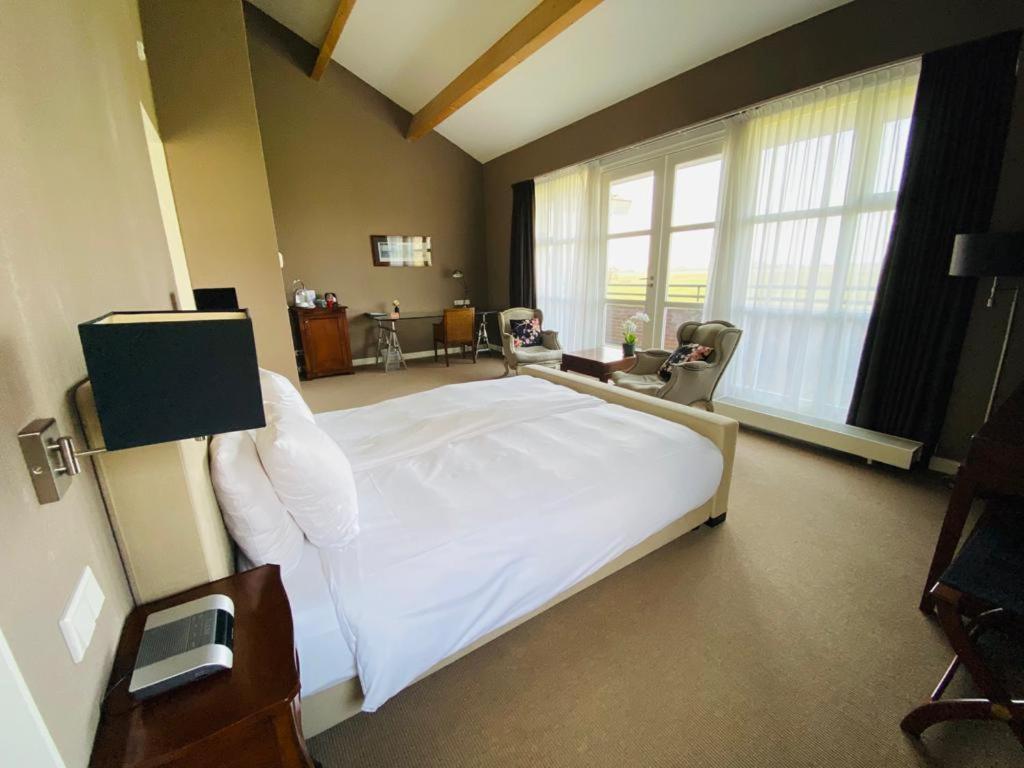 Landhotel De Ijsvogel Sint Nicolaasga ภายนอก รูปภาพ